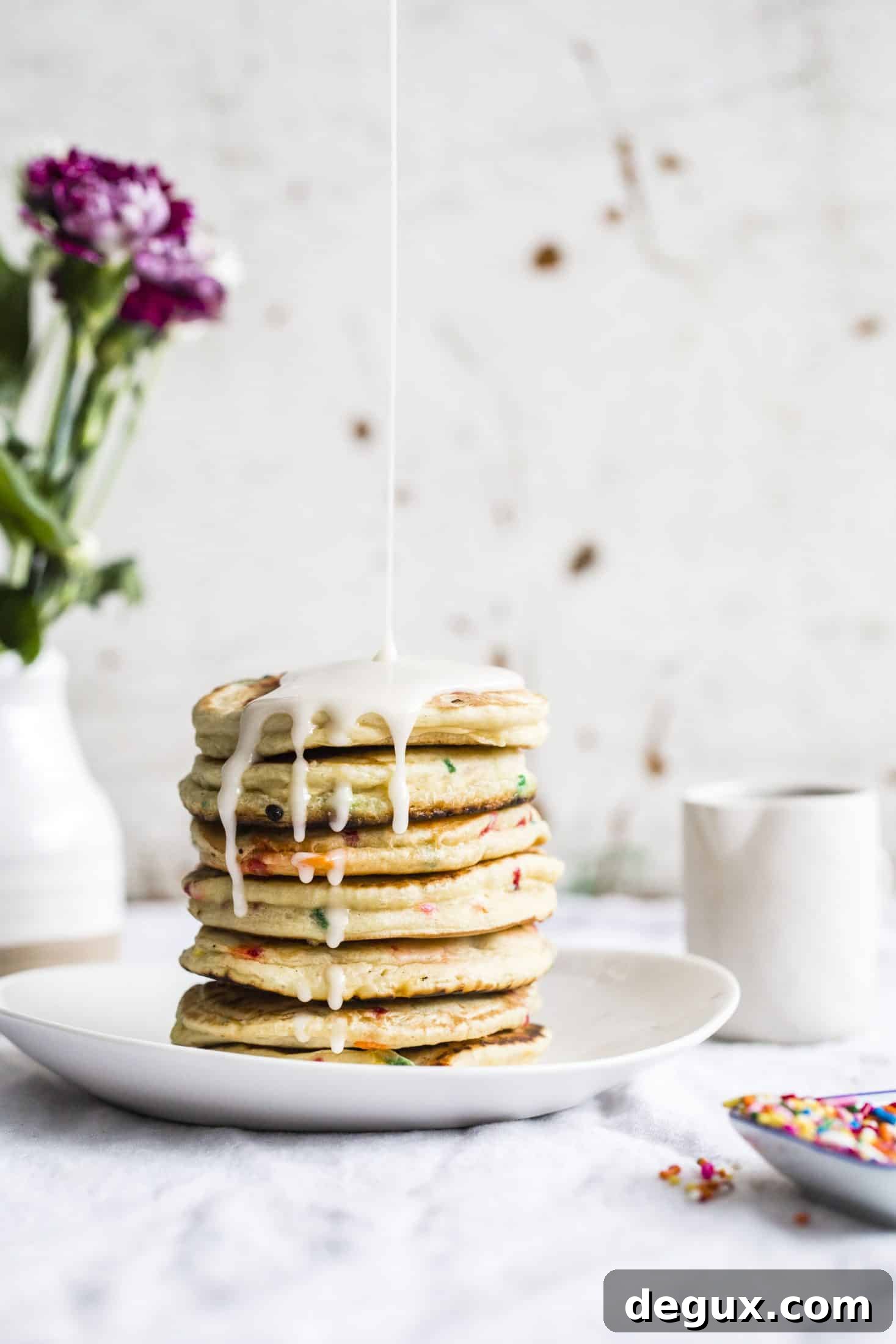 cake batter pancakes I howsweeteats.com #cakebatter #pancakes #breakfast #sprinkles #funfetti