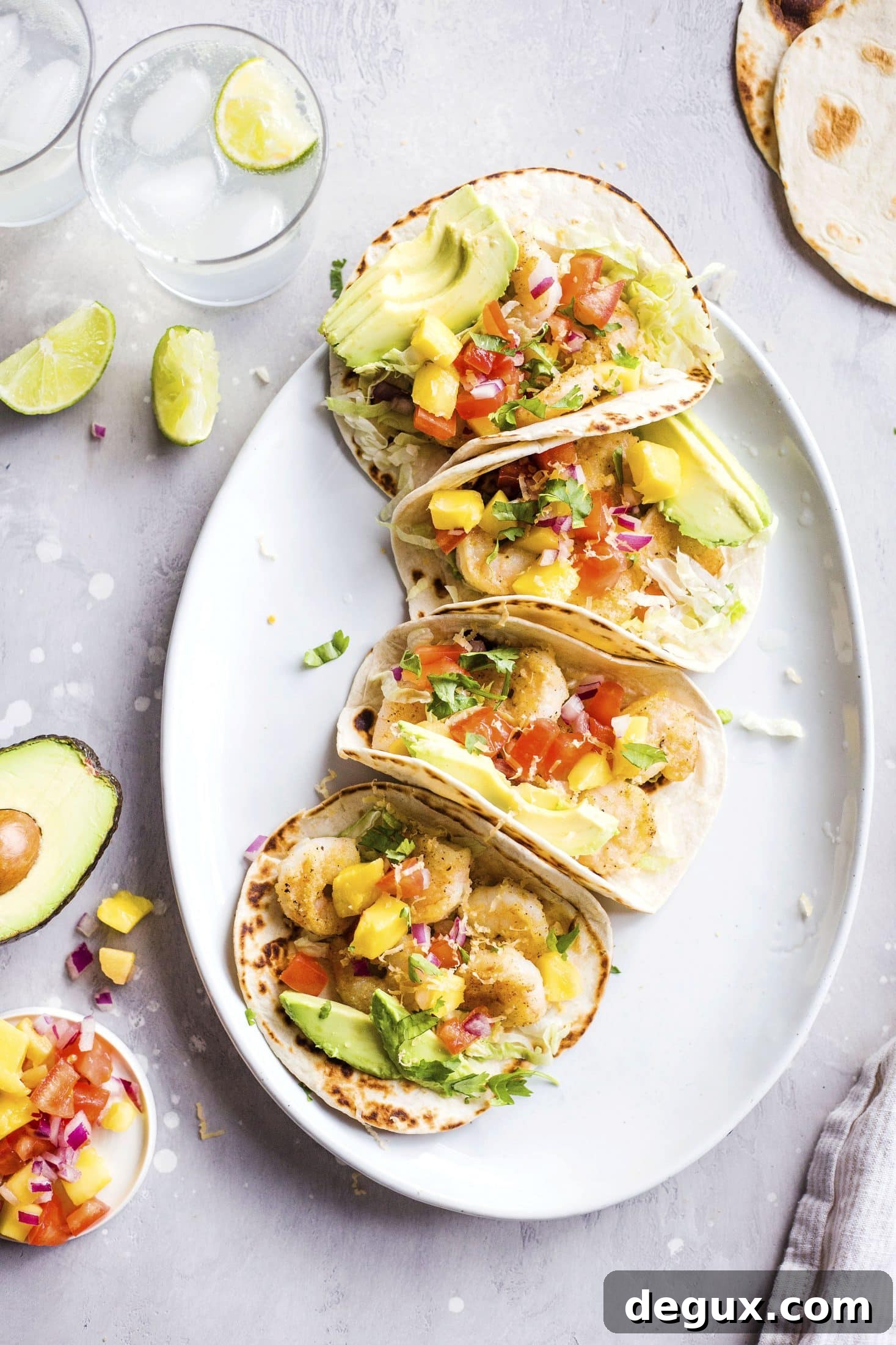 Crispy Shrimp Tacos with Lime Slaw and Spicy Aioli 2 crispy shrimp tacos I howsweeteats.com #shrimp #tacos #seafood #healthy #recipes