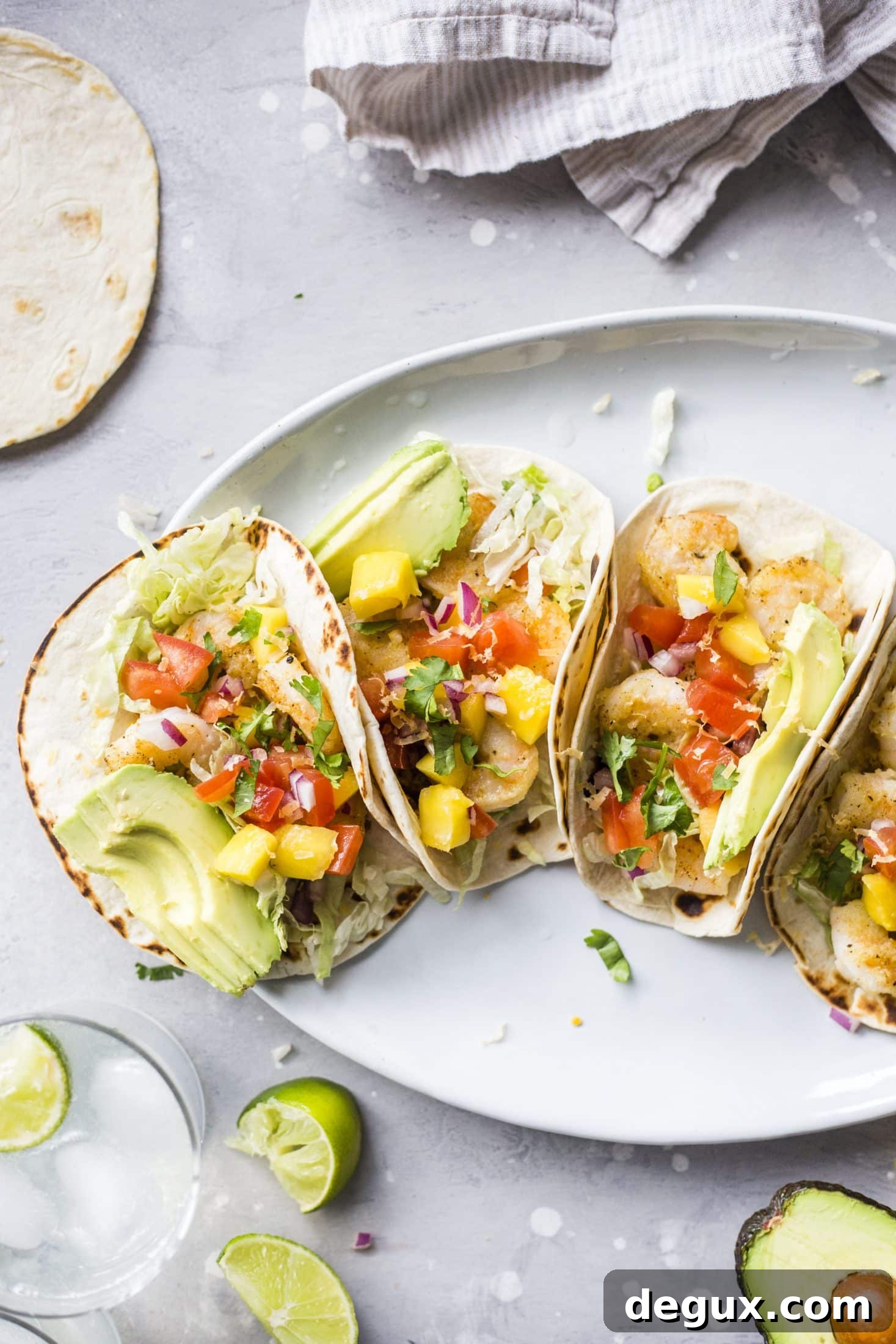 Crispy Shrimp Tacos with Lime Slaw and Spicy Aioli 4 crispy shrimp tacos I howsweeteats.com #shrimp #tacos #seafood #healthy #recipes
