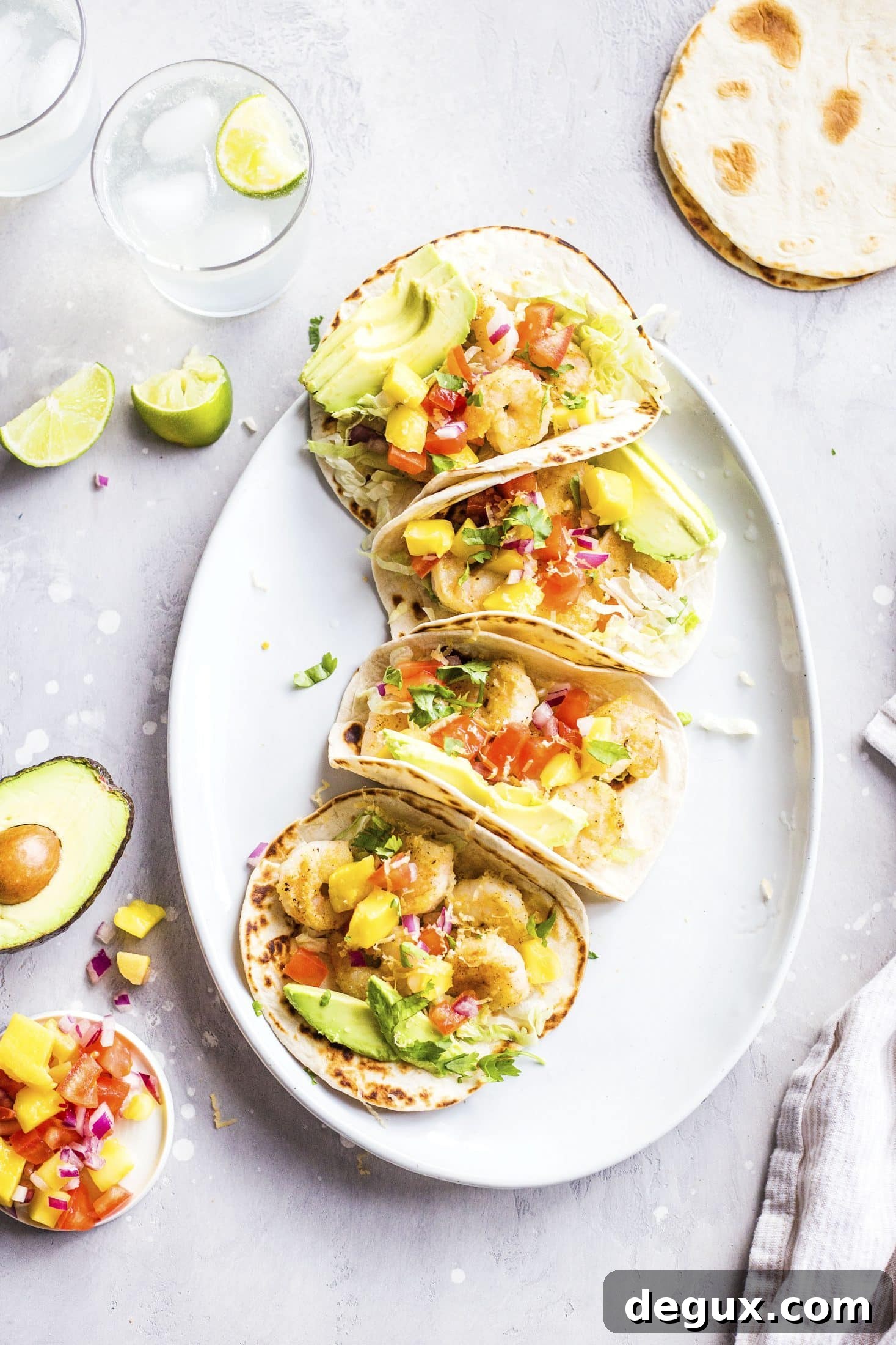 Crispy Shrimp Tacos with Lime Slaw and Spicy Aioli 7 crispy shrimp tacos I howsweeteats.com #shrimp #tacos #seafood #healthy #recipes