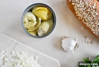 Cheesy Artichoke French Bread Recipe for Crispy, Gooey Slices