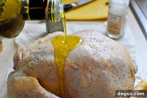 Oiled chicken ready to roast