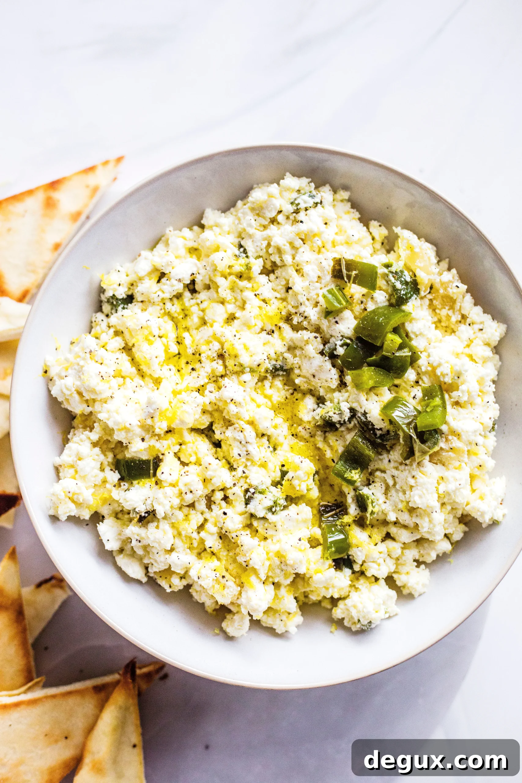 Creamy Feta Dip Recipe for Parties and Snacks 4 creamy feta dip (aka, crazy feta!) I howsweeteats.com #feta #dip #appetizer #recipes #cheese