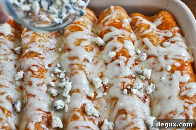 Buffalo Chicken Enchiladas I howsweeteats.com