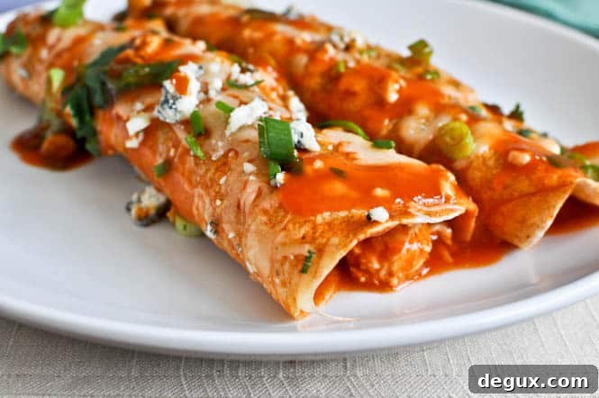 Buffalo Chicken Enchiladas I howsweeteats.com