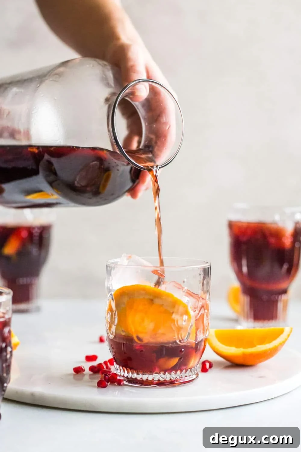 Pomegranate Vanilla Sangria Recipe for Festive Entertaining 3 Pomegranate sangria is the best winter sangria ever! It comes in the form of delicious pomegranate vanilla sangria with lots of red wine and brandy. It's perfect for the cooler months and it will warm you right up. I howsweeteats.com #pomegranate #sangria