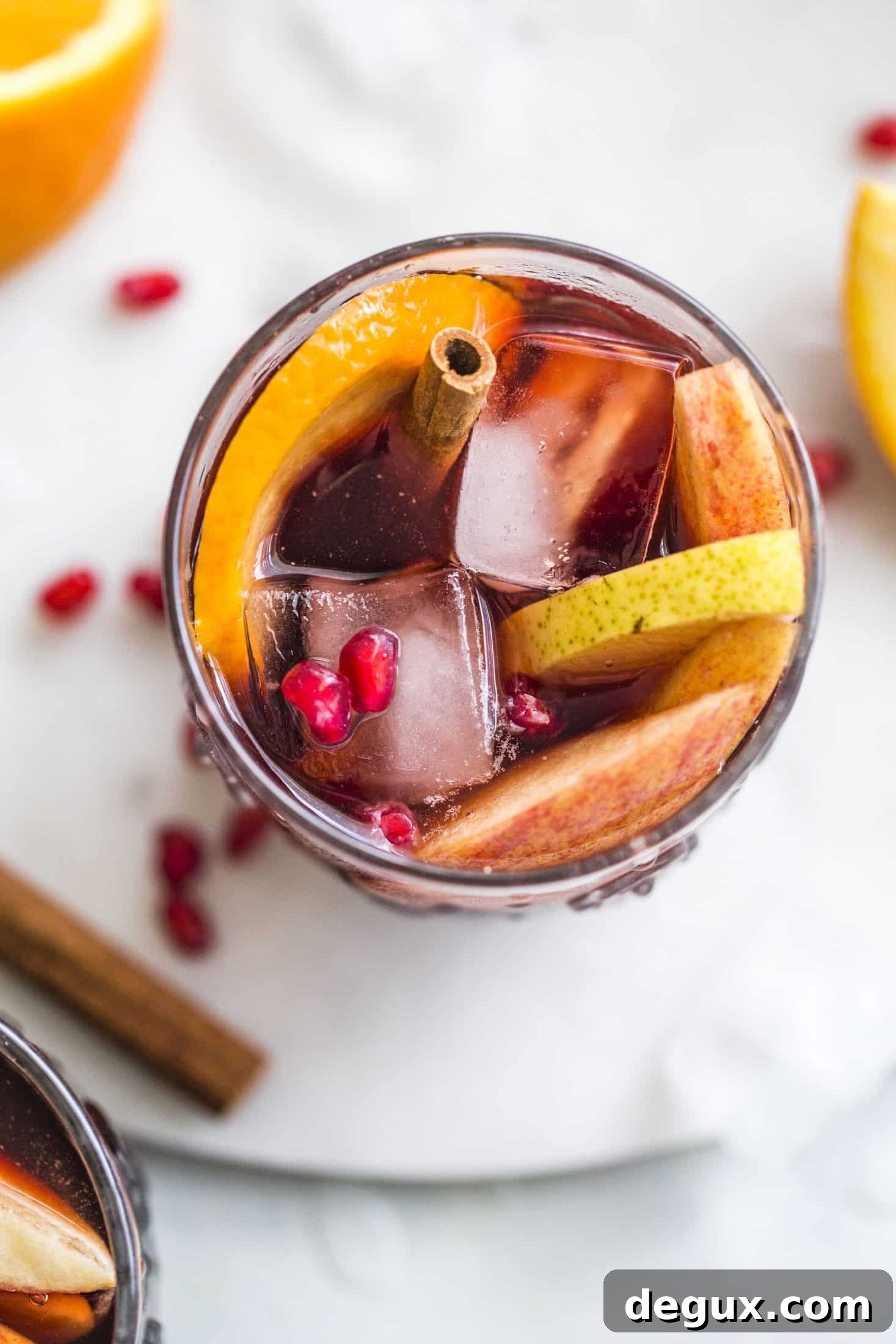 Pomegranate Vanilla Sangria Recipe for Festive Entertaining 4 Pomegranate sangria is the best winter sangria ever! It comes in the form of delicious pomegranate vanilla sangria with lots of red wine and brandy. It's perfect for the cooler months and it will warm you right up. I howsweeteats.com #pomegranate #sangria