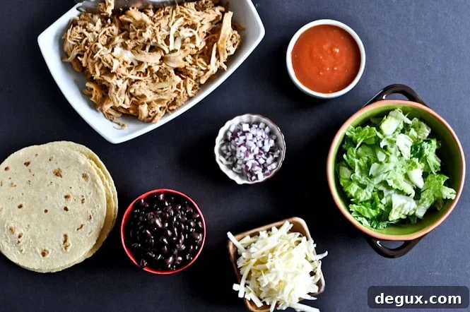 Crockpot Cheddar Beer Chicken Tacos