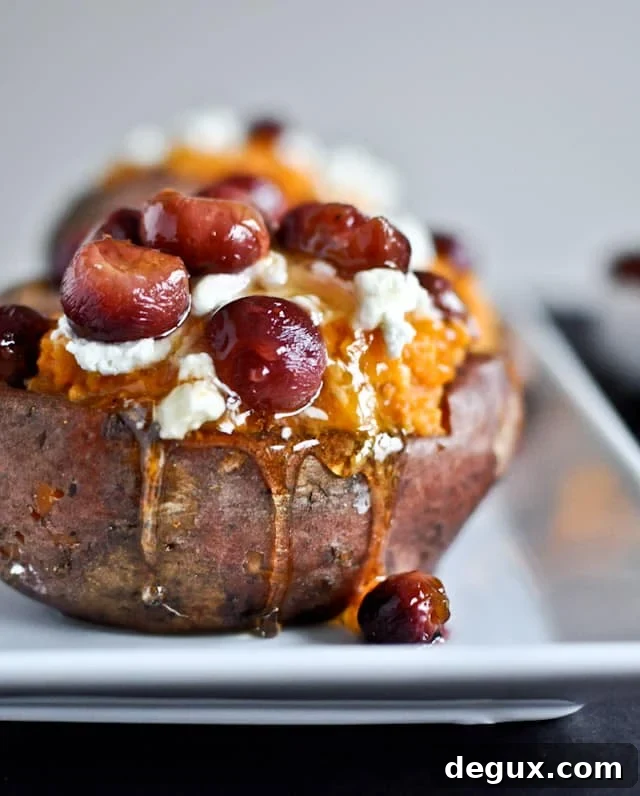 Close up of roasted grapes and goat cheese