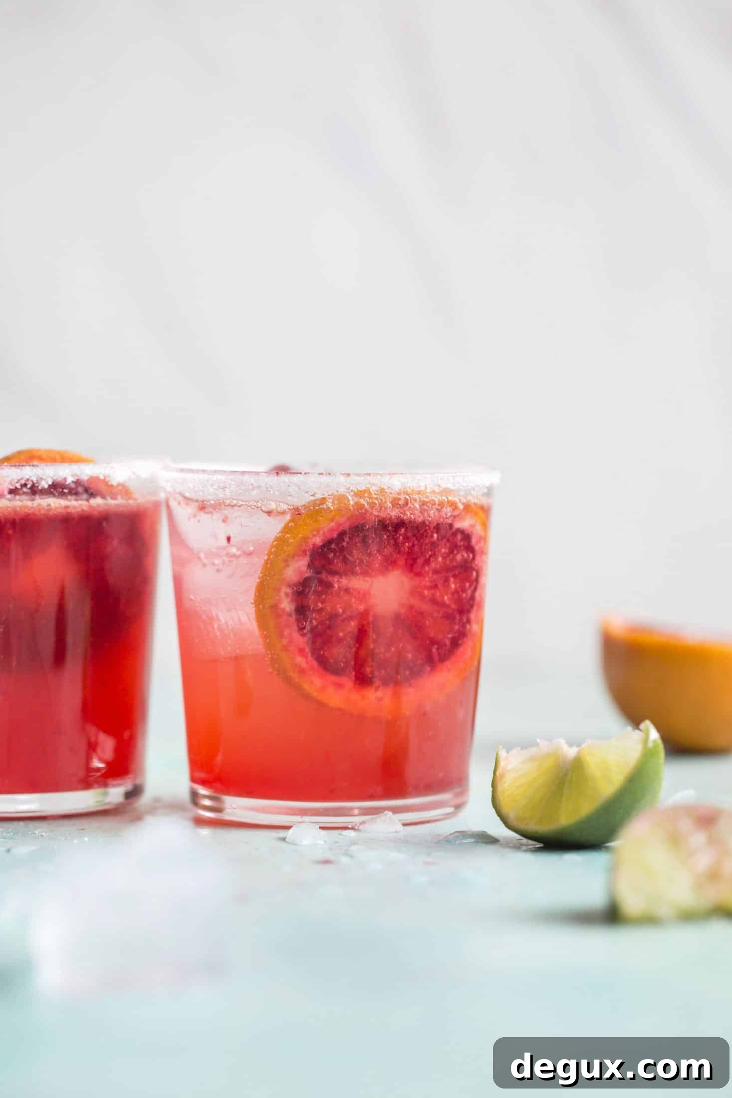 Blood Orange Margarita Recipe: Bright, Refreshing Cocktail Guide 2 blood orange margarita I howsweeteats.com #bloodorange #margarita #cocktails #orange #tequila