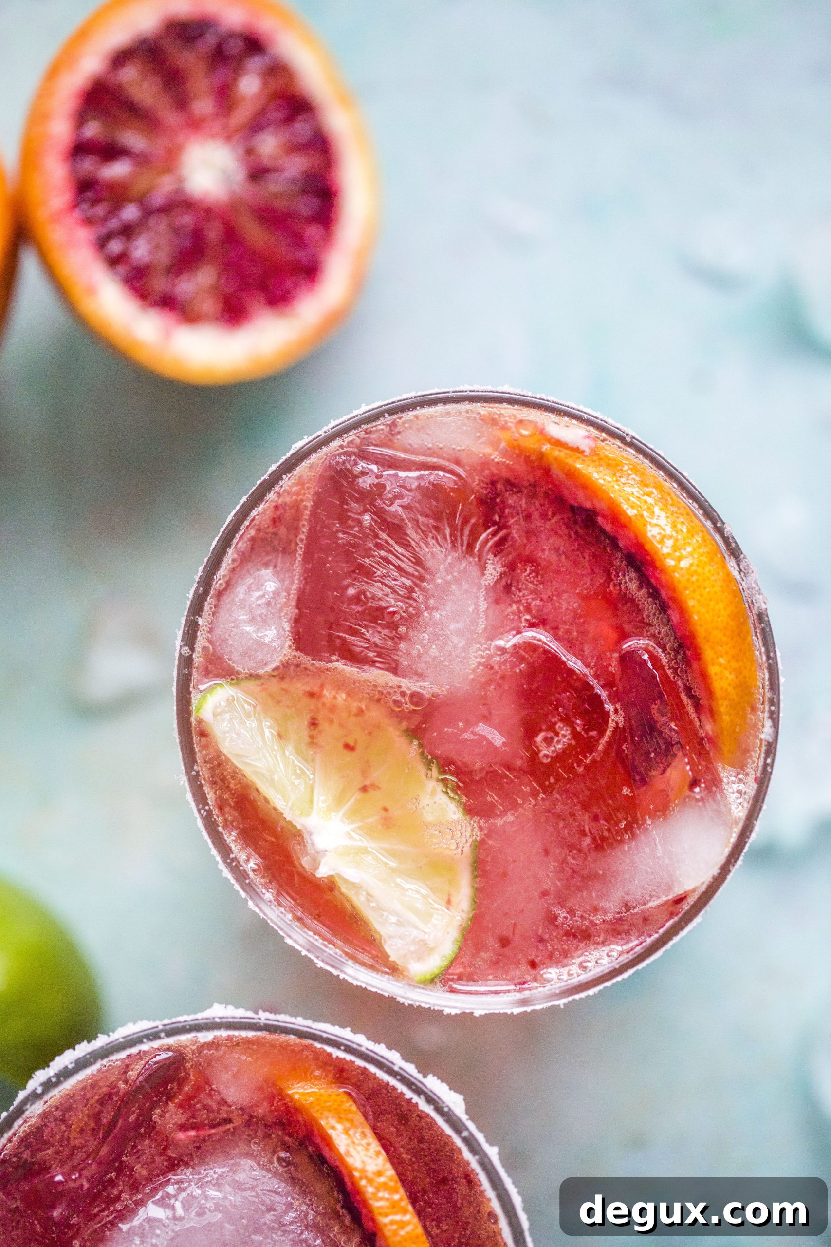Blood Orange Margarita Recipe: Bright, Refreshing Cocktail Guide 3 blood orange margarita I howsweeteats.com #bloodorange #margarita #cocktails #orange #tequila