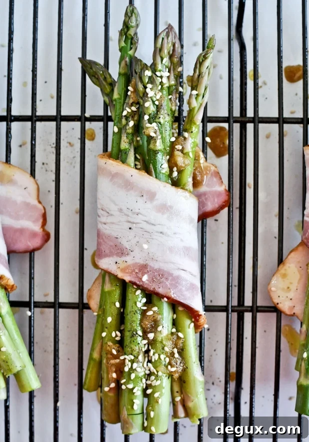 Bacon Wrapped Caramelized Sesame Asparagus I howsweeteats.com Bacon Wrapped Caramelized Sesame Asparagus I howsweeteats.com