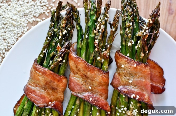 Bacon Wrapped Caramelized Sesame Asparagus I howsweeteats.com Bacon Wrapped Caramelized Sesame Asparagus I howsweeteats.com