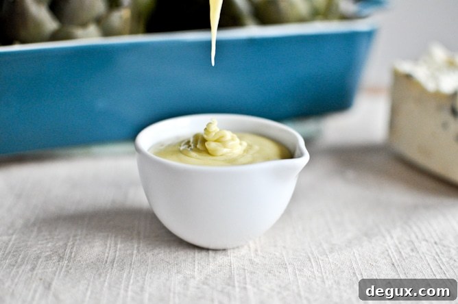 Herb Gorgonzola Artichokes with Parmesan Hollandaise Herb Gorgonzola Artichokes with Parmesan Hollandaise