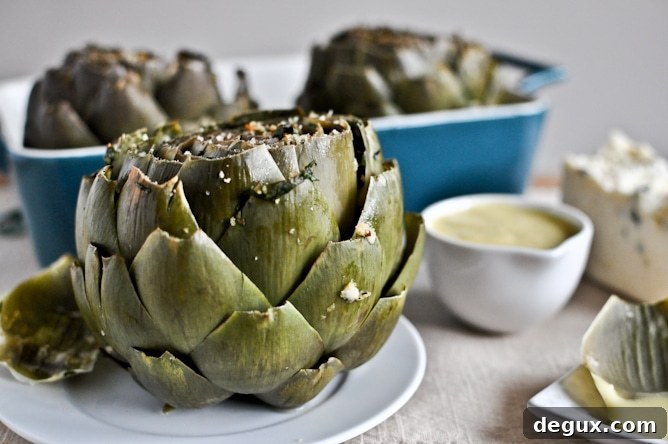 Herb Gorgonzola Artichokes with Parmesan Hollandaise Herb Gorgonzola Artichokes with Parmesan Hollandaise