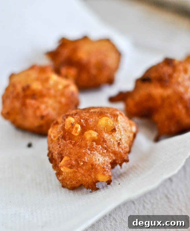 Sweet Corn Fritters with Jalapeño Whipped Cream and Fruit Salsa