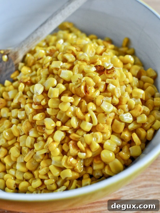 Hot + Cheesy Caramelized Corn Dip I howsweeteats.com