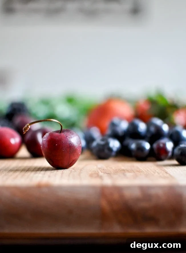 Triple Berry Kale Salad with Fresh Strawberry Vinaigrette