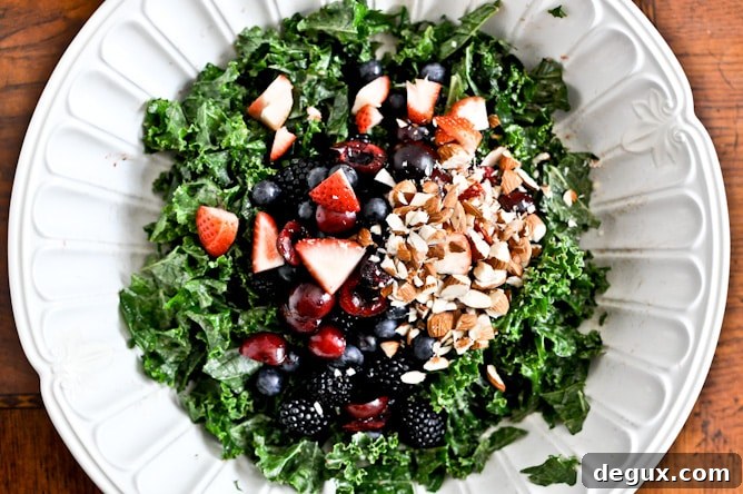 Triple Berry Kale Salad with Fresh Strawberry Vinaigrette