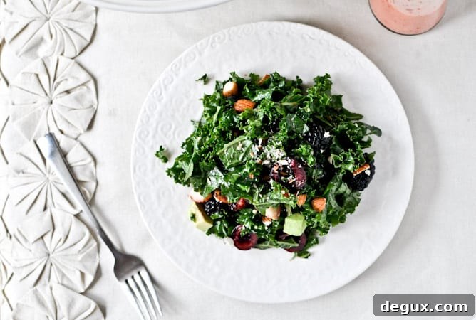 Triple Berry Kale Salad with Fresh Strawberry Vinaigrette