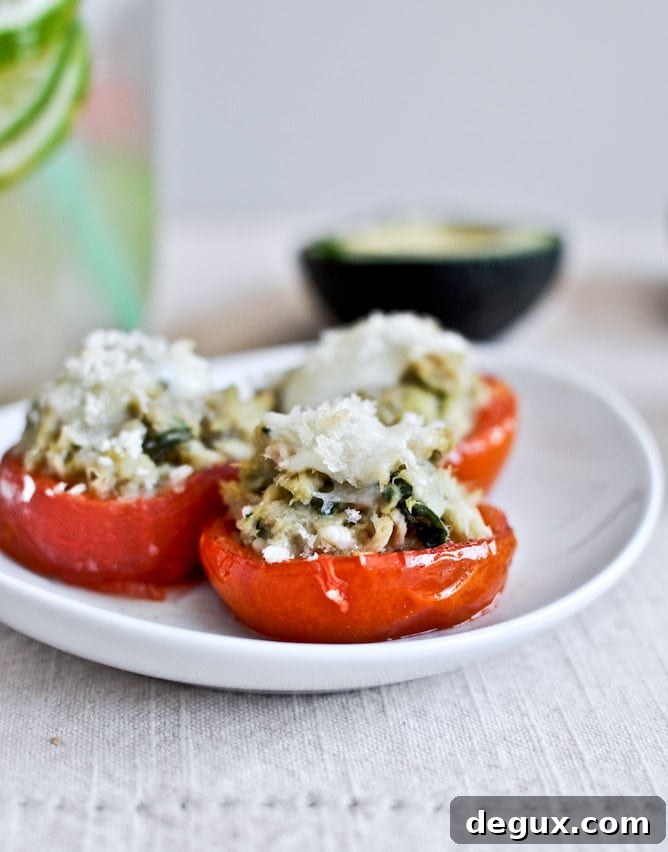 Mini Roasted Tomato Cups with Avocado, White Bean + Tuna Mash Mini Roasted Tomato Cups with Avocado, White Bean + Tuna Mash