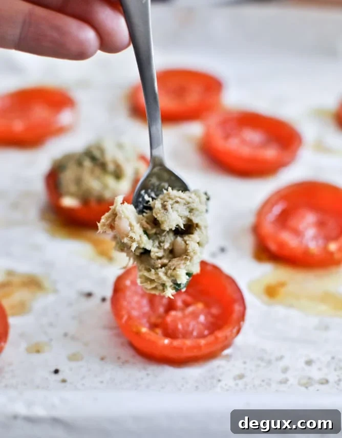 Mini Roasted Tomato Cups with Avocado, White Bean + Tuna Mash Mini Roasted Tomato Cups with Avocado, White Bean + Tuna Mash