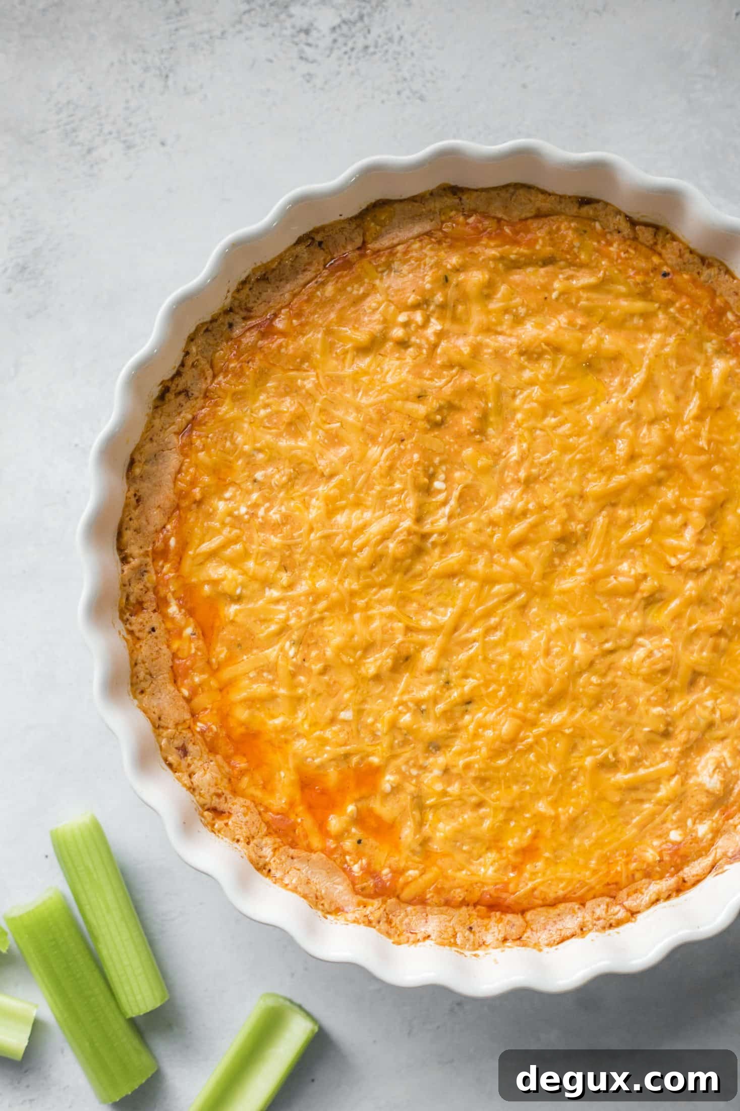 This is the best buffalo chicken dip recipe! Creamy, cheesy, slightly spicy and full of delicious chicken and flavors. Perfect for tailgating, football games, parties and weekends. This recipe is classic and super easy to make. I howsweeteats.com #buffalo #chicken #dip #recipe
