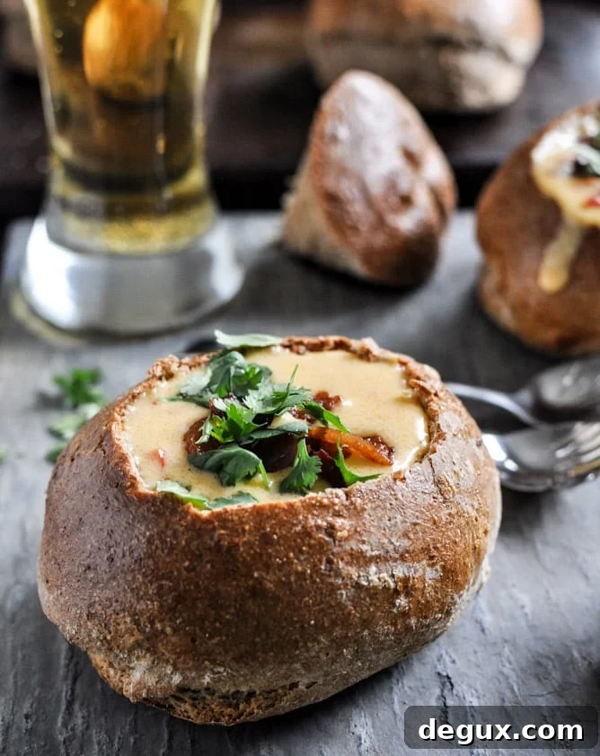 Beer Cheese Soup in Easy Homemade Whole Wheat Bread Bowls I howsweeteats.com