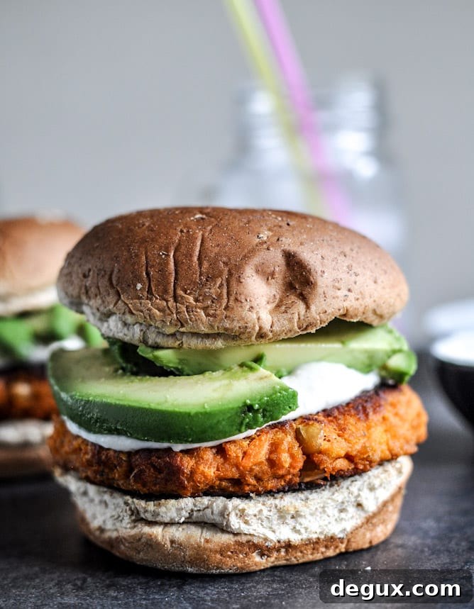 Smoky Sweet Potato Burgers with Roasted Garlic Cream and Avocado