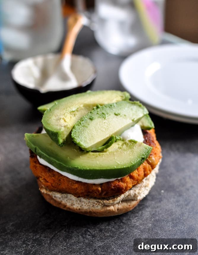 Smoky Sweet Potato Burgers with Roasted Garlic Cream and Avocado