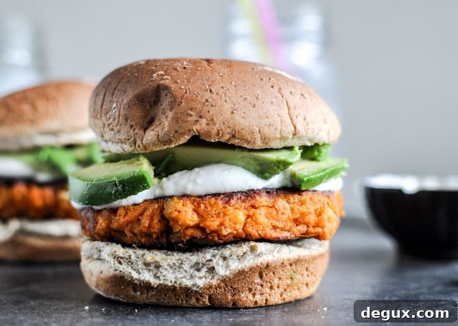 Smoky Sweet Potato Burgers with Roasted Garlic Cream and Avocado