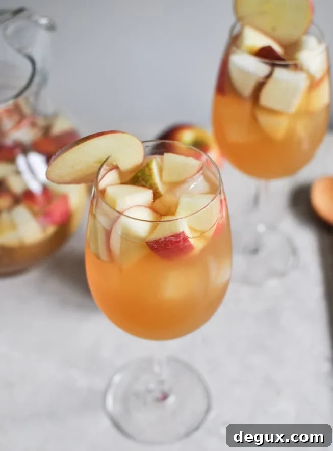 Apple Cider Sangria I howsweeteats.com Apple Cider Sangria I howsweeteats.com
