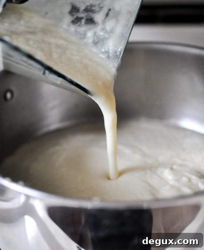 Creamy Cauliflower Soup I howsweeteats.com