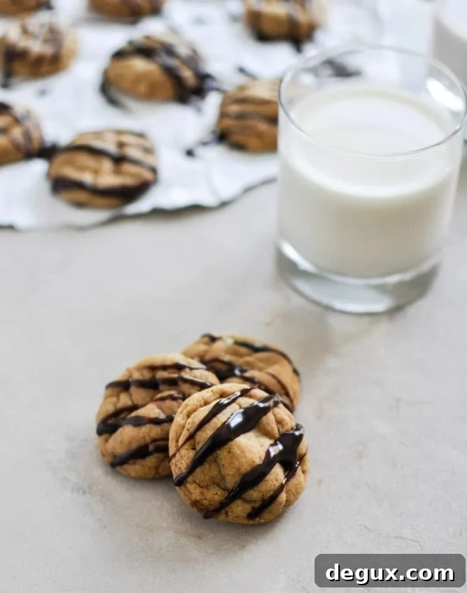 Fudge Striped Pumpkin Peanut Butter Cookies I howsweeteats.com Fudge Striped Pumpkin Peanut Butter Cookies I howsweeteats.com