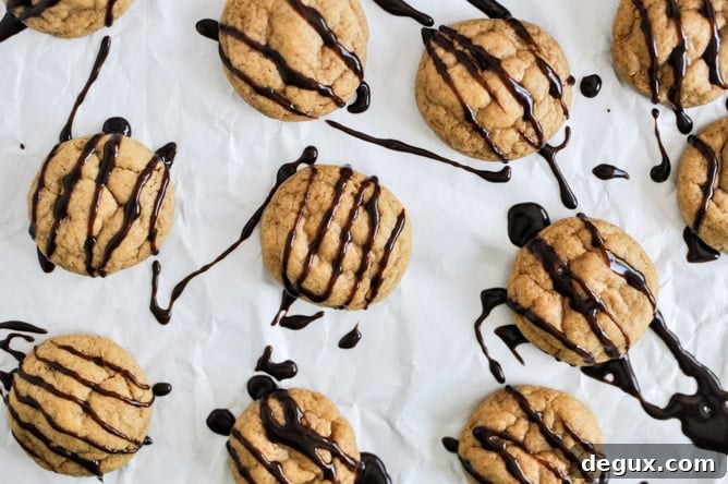 Fudge Striped Pumpkin Peanut Butter Cookies I howsweeteats.com Fudge Striped Pumpkin Peanut Butter Cookies I howsweeteats.com