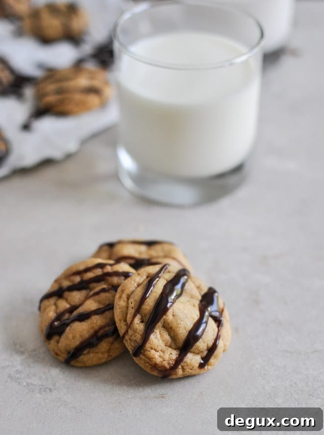 Fudge Striped Pumpkin Peanut Butter Cookies I howsweeteats.com Fudge Striped Pumpkin Peanut Butter Cookies I howsweeteats.com