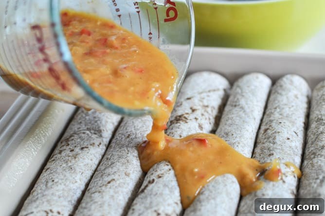 Lightened Up Chicken Enchiladas I howsweeteats.com