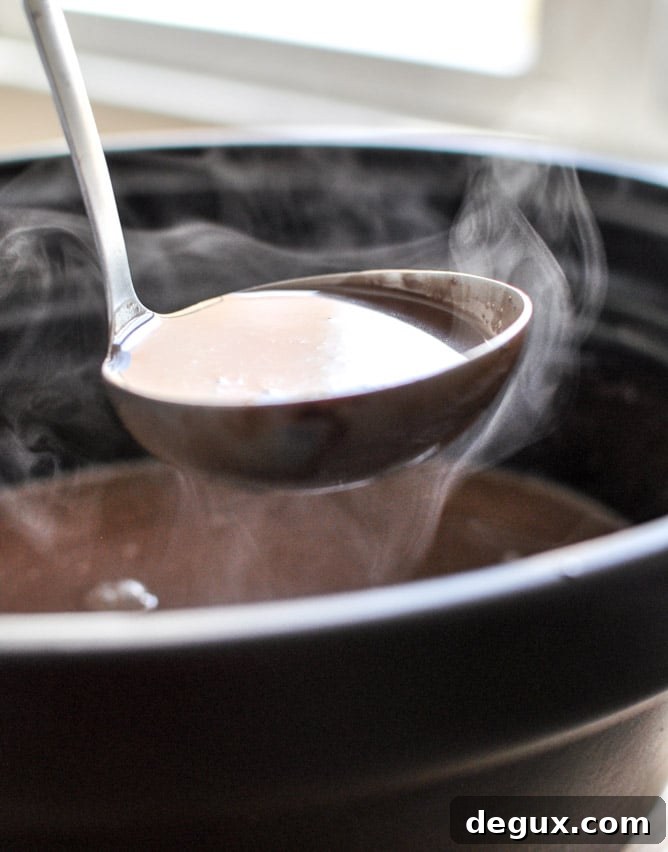 Crockpot Coconut Hot Chocolate I howsweeteats.com Crockpot Coconut Hot Chocolate I howsweeteats.com