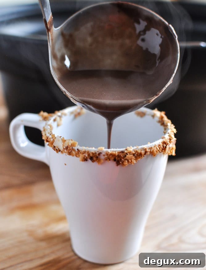 Crockpot Coconut Hot Chocolate I howsweeteats.com Crockpot Coconut Hot Chocolate I howsweeteats.com