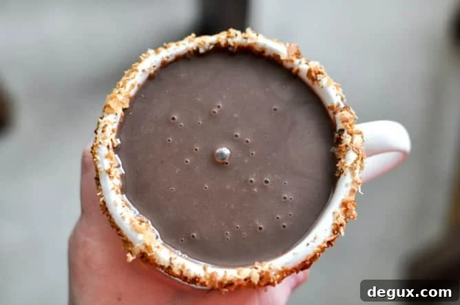 Crockpot Coconut Hot Chocolate I howsweeteats.com Crockpot Coconut Hot Chocolate I howsweeteats.com