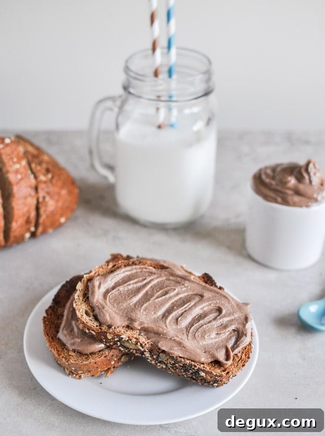 Homemade Milk Chocolate Cashew Butter I howsweeteats.com Homemade Milk Chocolate Cashew Butter I howsweeteats.com
