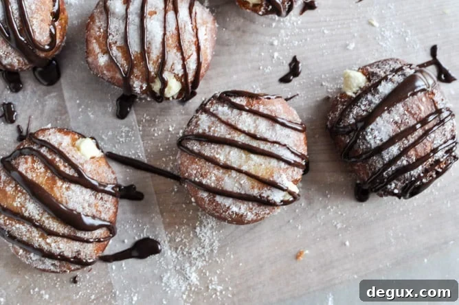 Peanut Butter Cream Filled Donuts I howsweeteats.com