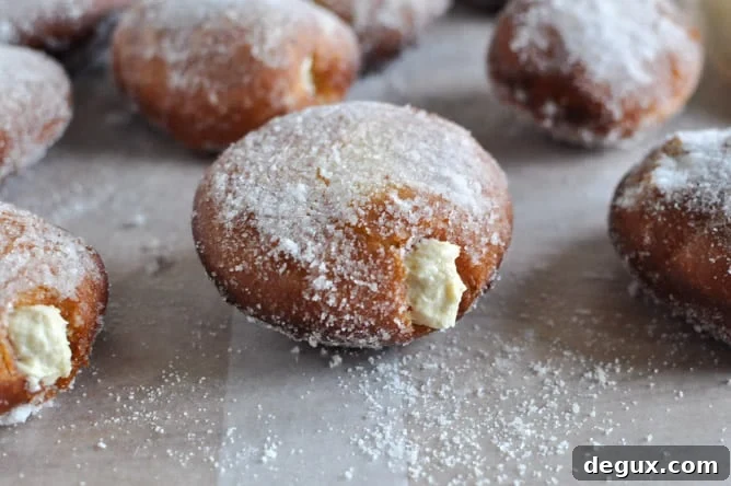 Peanut Butter Cream Filled Donuts I howsweeteats.com