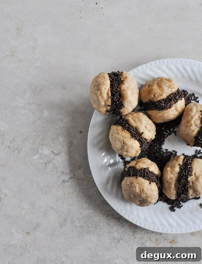 Fat Little Peanut Butter Oatmeal Cookie Sandwiches with Chocolate Ganache I howsweetetas.com