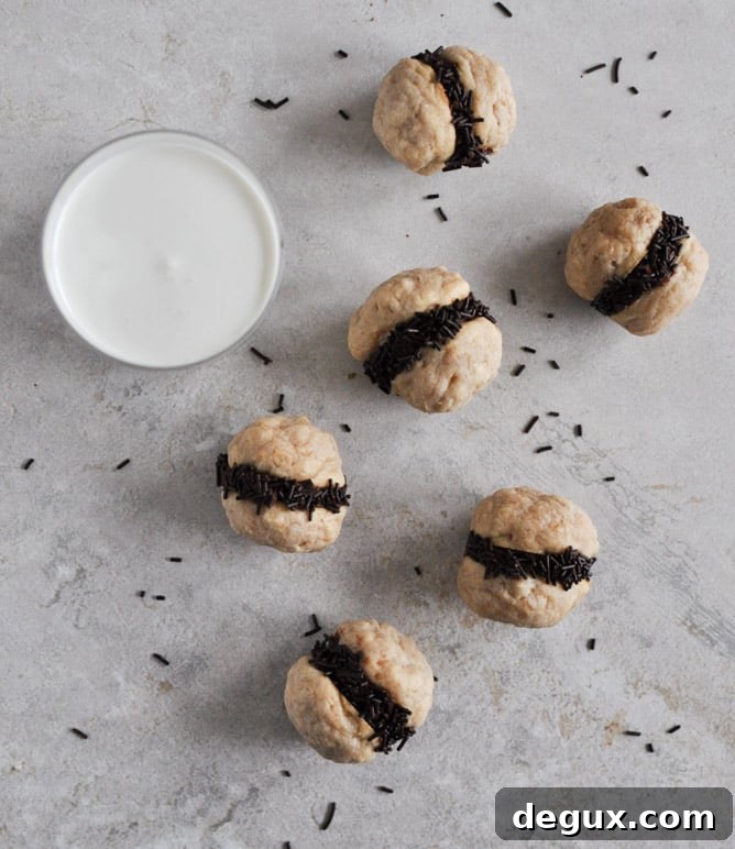 Fat Little Peanut Butter Oatmeal Cookie Sandwiches with Chocolate Ganache I howsweetetas.com