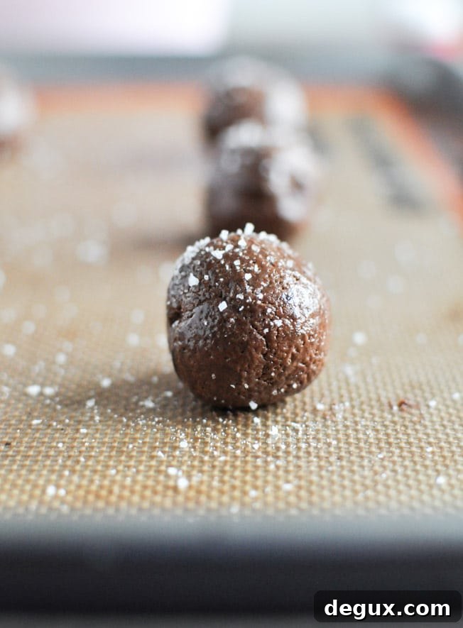 Salted Dark Chocolate Truffle Cookies I howsweeteats.com