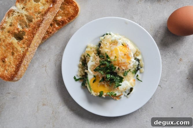 Fontina and Spinach Baked Eggs with Garlic Brown Butter Breadcrumbs I howsweeteats.com Fontina and Spinach Baked Eggs with Garlic Brown Butter Breadcrumbs I howsweeteats.com