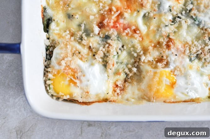 Fontina and Spinach Baked Eggs with Garlic Brown Butter Breadcrumbs I howsweeteats.com Fontina and Spinach Baked Eggs with Garlic Brown Butter Breadcrumbs I howsweeteats.com