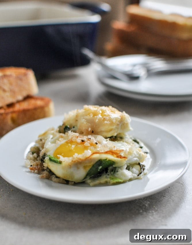 Fontina and Spinach Baked Eggs with Garlic Brown Butter Breadcrumbs I howsweeteats.com Fontina and Spinach Baked Eggs with Garlic Brown Butter Breadcrumbs I howsweeteats.com