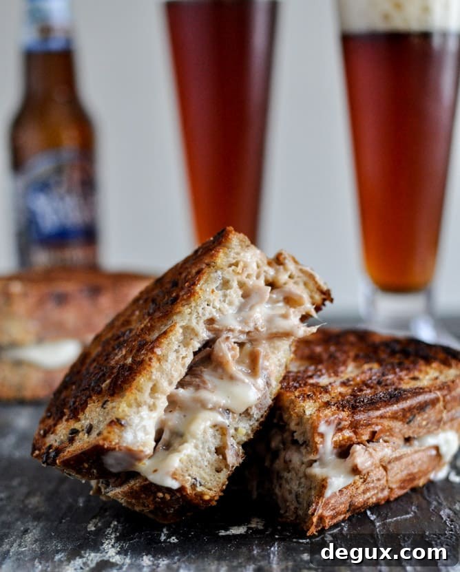 Crockpot Pulled Pork + Beer Cheese Grilled Cheese Sandwiches I howsweeteats.com Crockpot Pulled Pork + Beer Cheese Grilled Cheese Sandwiches I howsweeteats.com